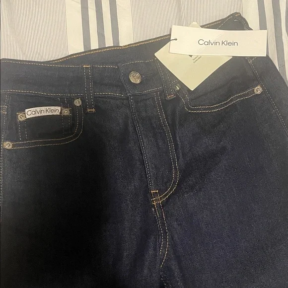 Calvin Klein High Rise Flared Jeans - Picture 6 of 7